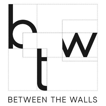 between the walls